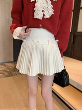 Minifalda plisada con lazo pequeño